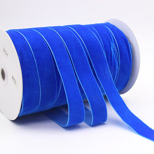 Royal blue Household Portable Solid Color Velvet Ribbon spool, bold and vibrant for festive crafts, gift wrapping, and décor.