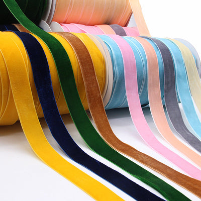 Household Portable Solid Color Velvet Ribbon in assorted colors on spools, ideal for gift wrapping, crafts, and home décor projects.