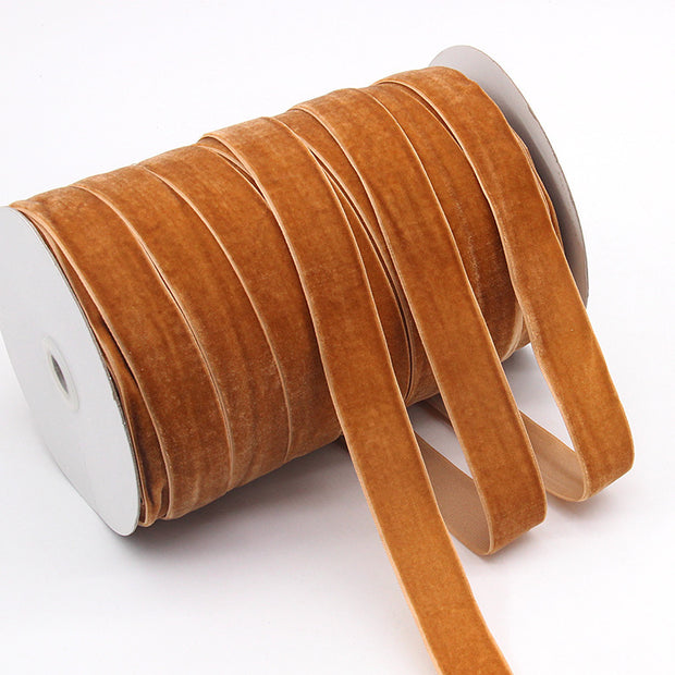 Brown Household Portable Solid Color Velvet Ribbon roll, rich earthy tone ideal for rustic crafts, seasonal décor, and packaging.