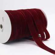 Dark red Household Portable Solid Color Velvet Ribbon spool, luxurious tone perfect for romantic crafts, gift wrapping, and décor.